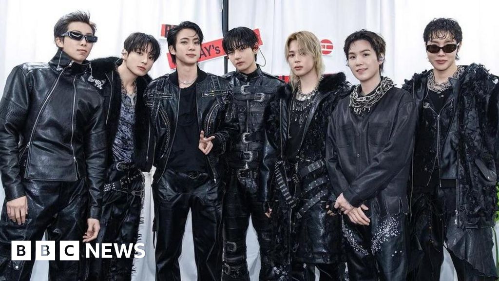 BTS battle torrential rain to kick off $1bn world tour