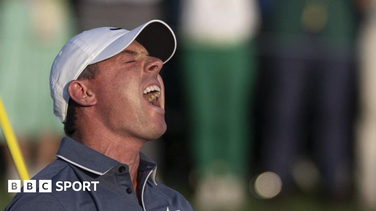 Matthew Harris, golf photographer, with his camera