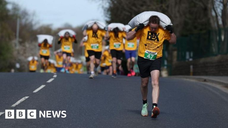 Hundreds take part in Gawthorpe coal-carrying race